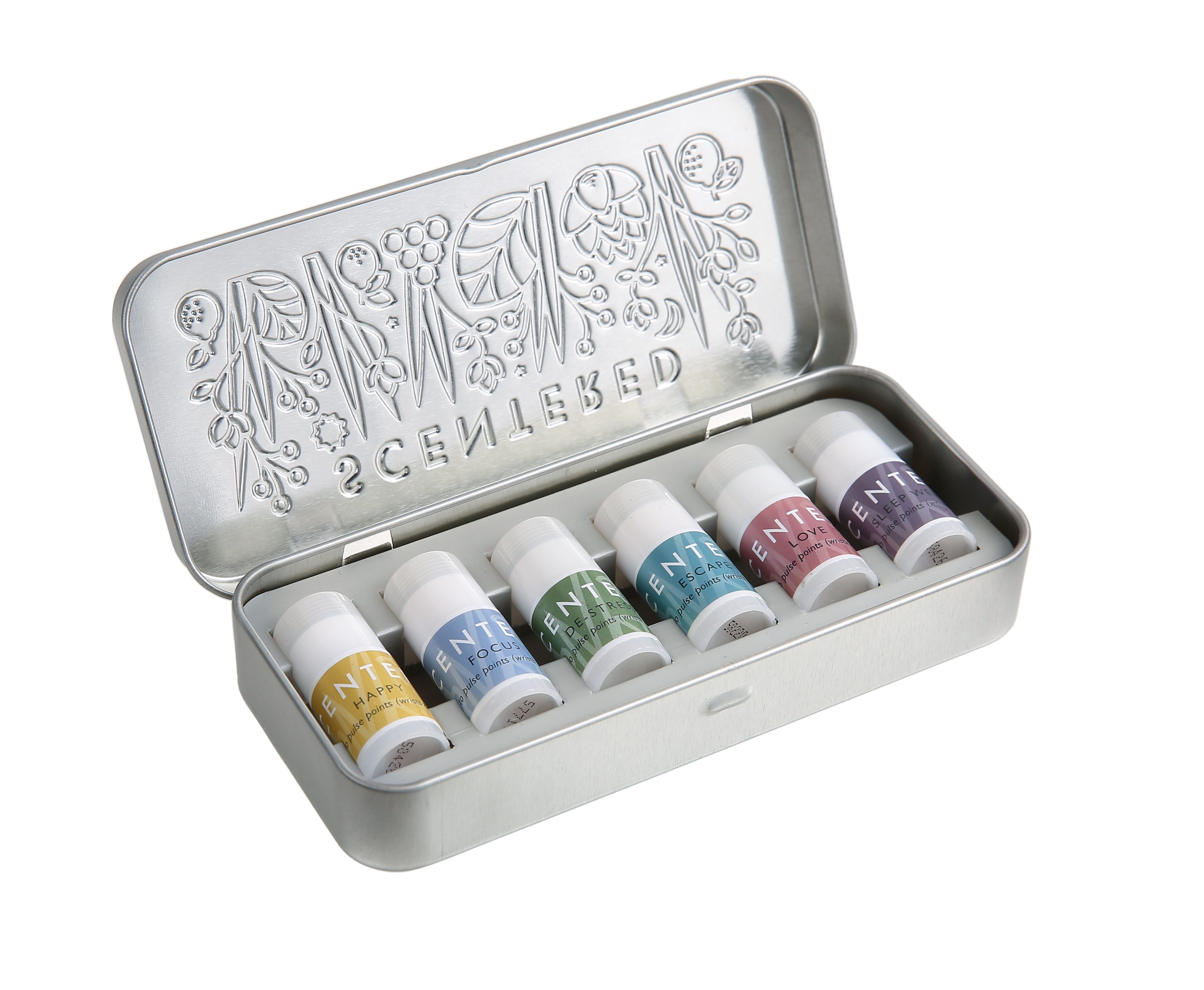 Scentered Aromatherapy Discovery Starter Tin open showing the 6 Scentered aromatherapy mini  balms inside.  These are Happy, Focus, De-stress, Escape, Love  and Sleep Well Aromatherapy Mini balm pulse point sticks 1.5g