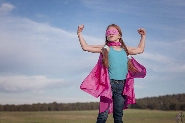 girl dressed as a super hero
