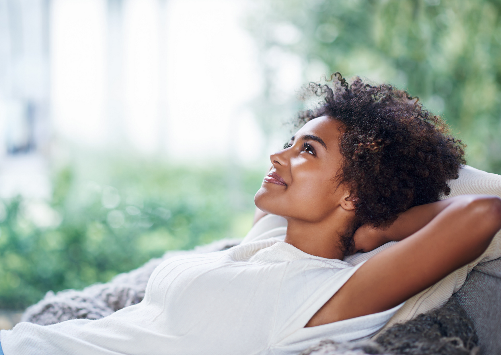 woman relaxing and smiling