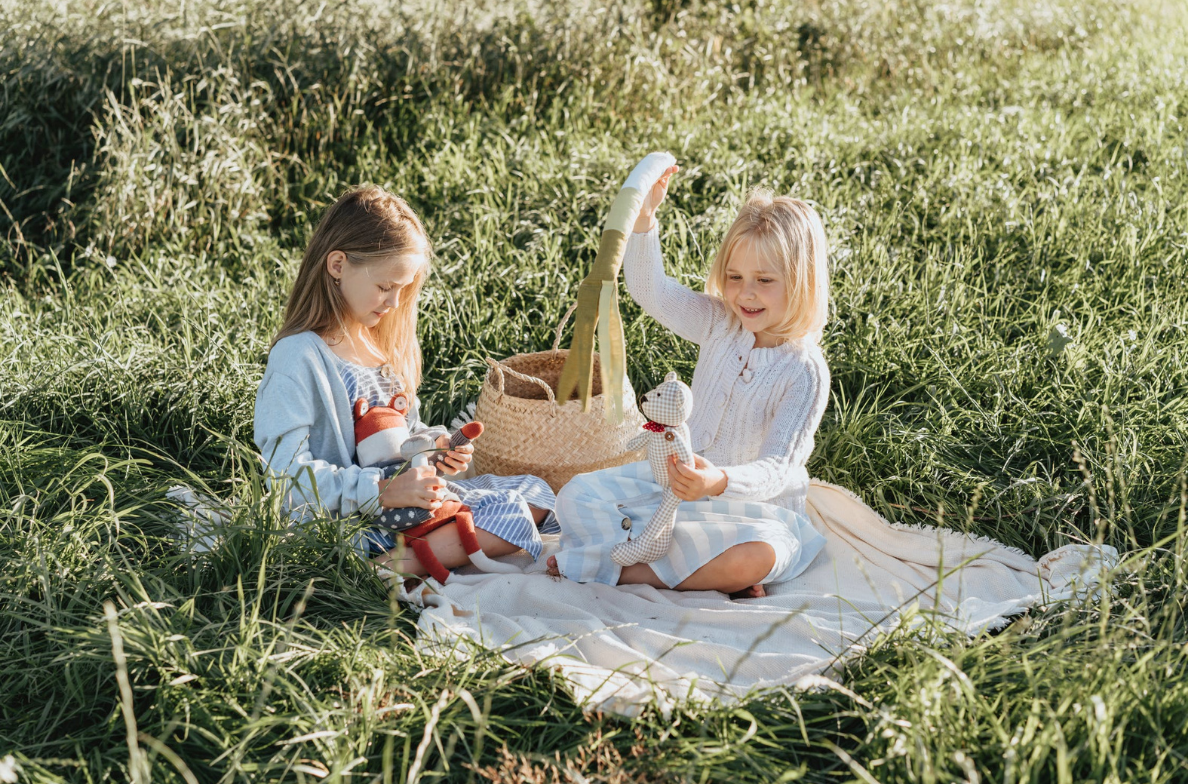 Two girls having a picnic